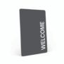Grey RFID hotel key card with the word “WELCOME” printed vertically in white
