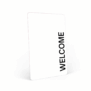 Carte-clé d’hôtel RFID blanche avec le mot « WELCOME » imprimé verticalement en noir